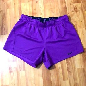 Purple Workout shorts, brand: Nike, size: L, Dri-Fit technology.